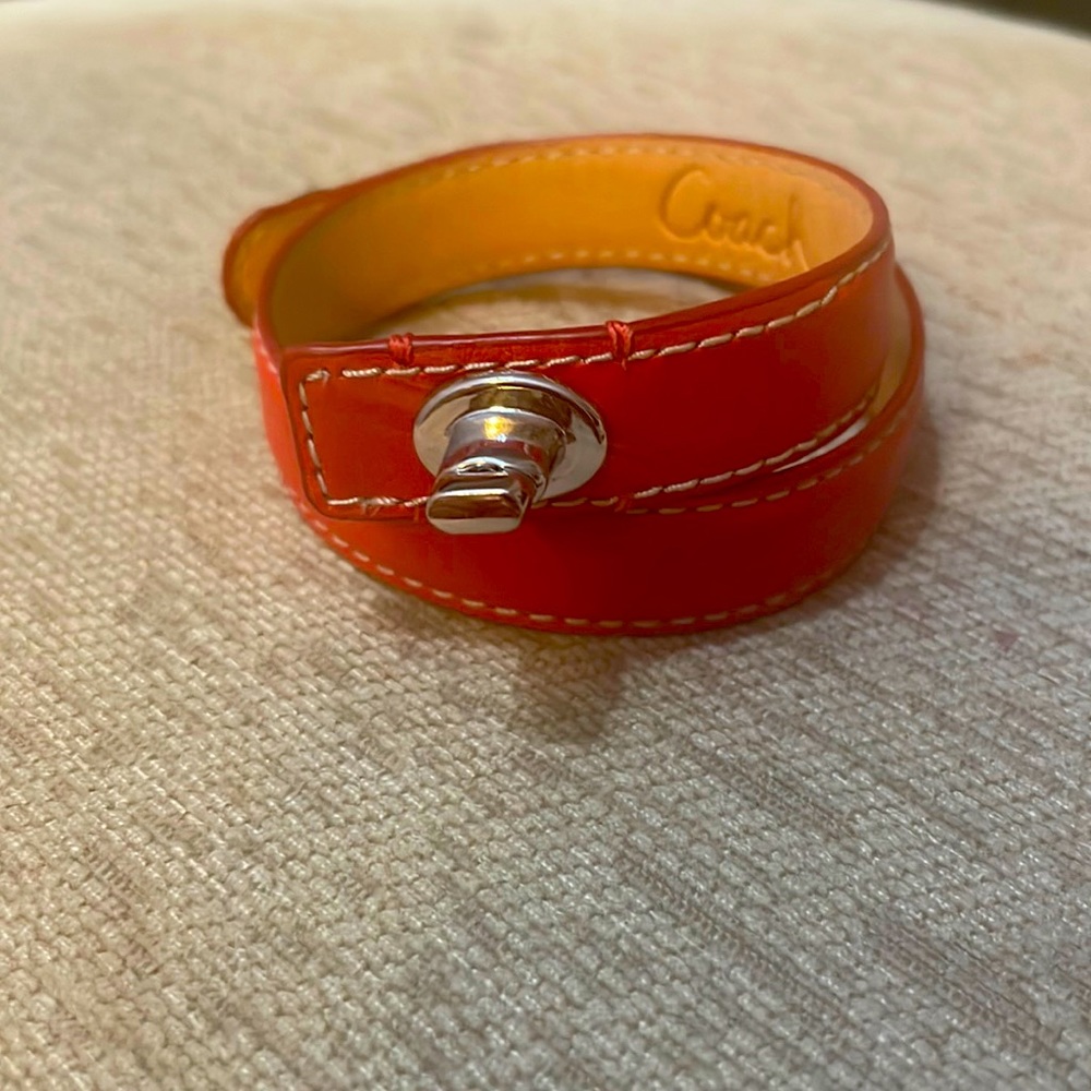 Red Coach leather wrap bracelet - never been worn.